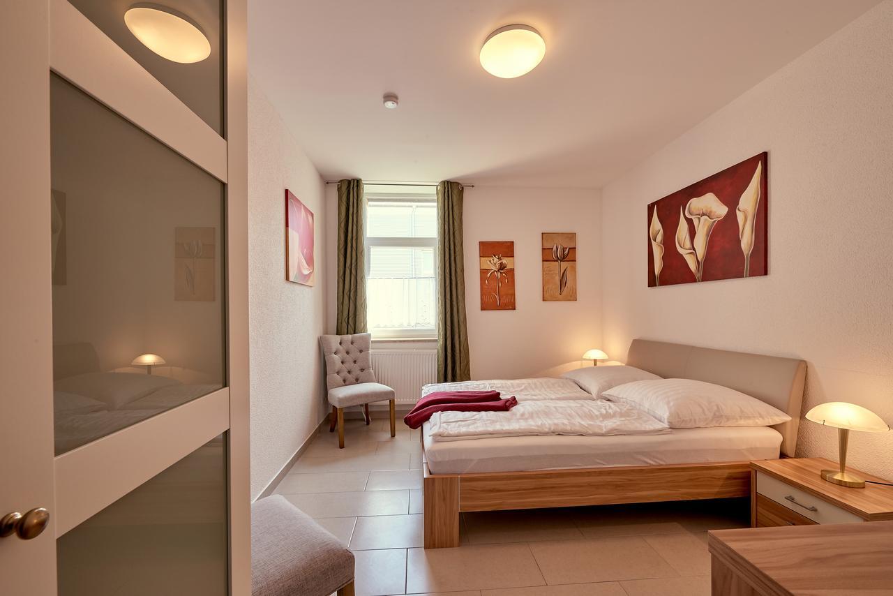 Hotel Zur Alten Stadtkellerei Λειψία Εξωτερικό φωτογραφία A bedroom